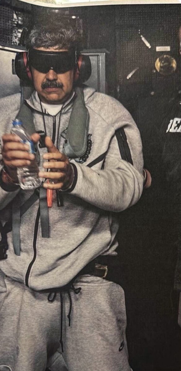 A photo posted by US President Donald Trump to Truth Social shows Venezuelan President Nicolas Maduro aboard the USS Iwo Jima after he was captured by US forces.