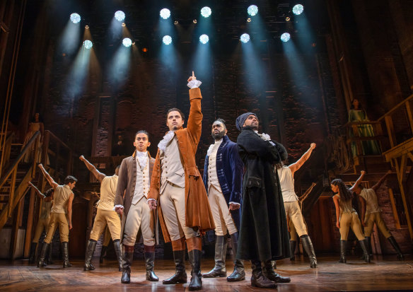 Jason Arrow (centre) returns as lead role Hamilton in the musical which starts its final season later this month.