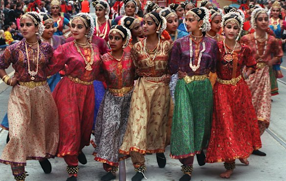 35 dancers from the Chandrabanu Bharatalaya Academy of Indian Dance make their way down Swanston Street in Moomba Parade, 2001.