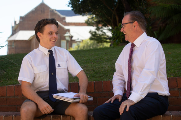 Stuart Ryan, director of pastoral care at the Shore School and Year 12 student Lachlan Brewer.