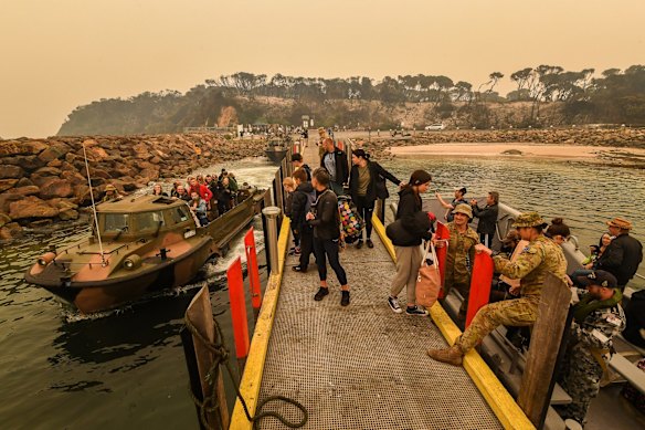Mallacoota Evacuations of people stranded after the bushfires that ravaged the town on December 30 2019. Evacuated by army personnel to the HMAS Choules Friday 3rd January 2020.
