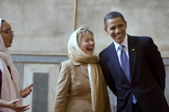 Barack Obama and Hillary Clinton tour the Sultan Hassan Mosque.