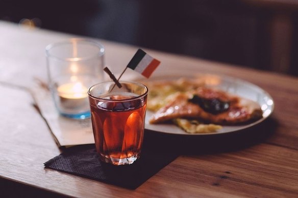 Maybe Frank waves the flag for good pizza and drinks (such as this biccicletta cocktail). 
