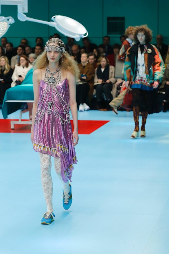 A model wears a creation as part of the Gucci women's Fall/Winter 2018-2019 collection.