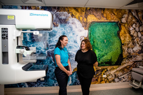Helen Karakontis, who has been diagnosed with hereditary breast cancer, with Jasmine Hancock, a radiographer at the Royal Hospital for Women, whose foundation raised funds to refurbish its diagnostic room.