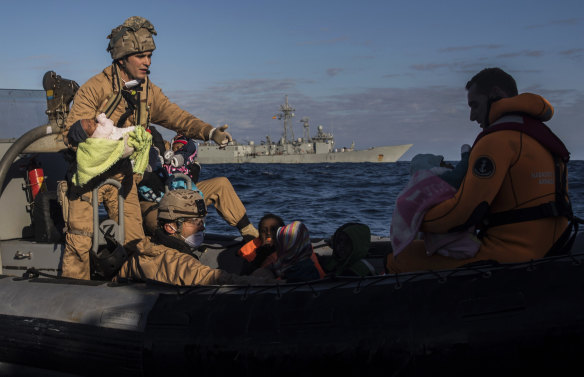 Spanish soldiers assist 329 refugees and migrants, mostly from Eritrea and Bangladesh, in collaboration with aid workers of the Spanish NGO Proactiva Open Arms, after they left Libya trying to reach European soil aboard an overcrowded wooden boat, from near Al-Khums, Libya. 
