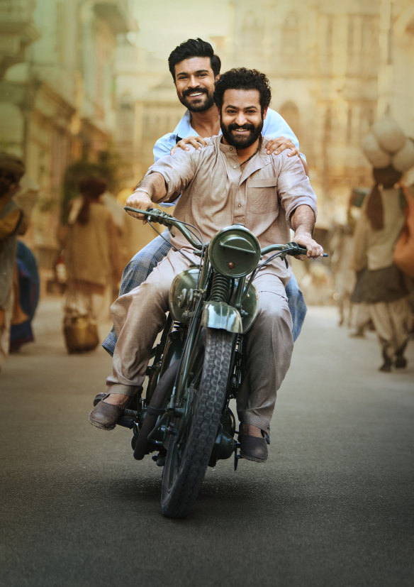 Ram Charan, rear, as Rama Raju and N.T. Rama Rao Jr as Komaram Bheem in RRR. The film has been a roaring success, in India and abroad.