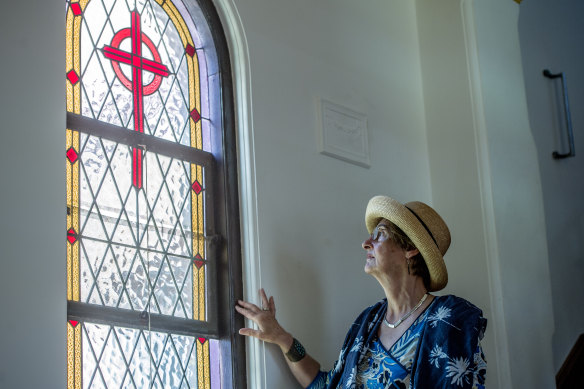 Owner Pamela Orr looks out of one of the windows in the convent's chapel, which was added as an extension to the building in 1932.