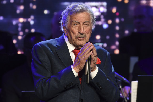 Singer Tony Bennett performs at the Statue of Liberty Museum opening celebration in New York in 2019. 