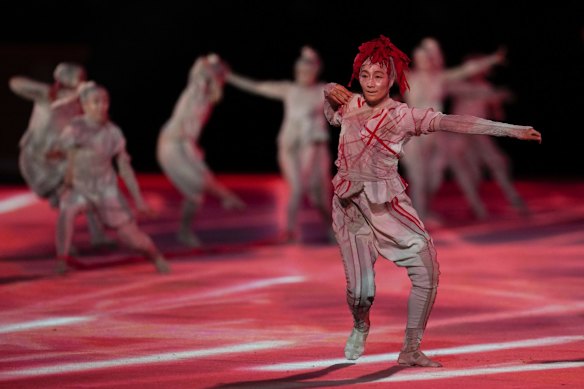 Dancers perform during the opening ceremony in the Olympic Stadium at the 2020 Summer Olympics, Friday, July 23, 2021, in Tokyo, Japan.
