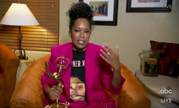 Regina King accepts the award for outstanding lead actress in a limited series or movie for "Watchmen" during the 72nd Emmy Awards broadcast. 