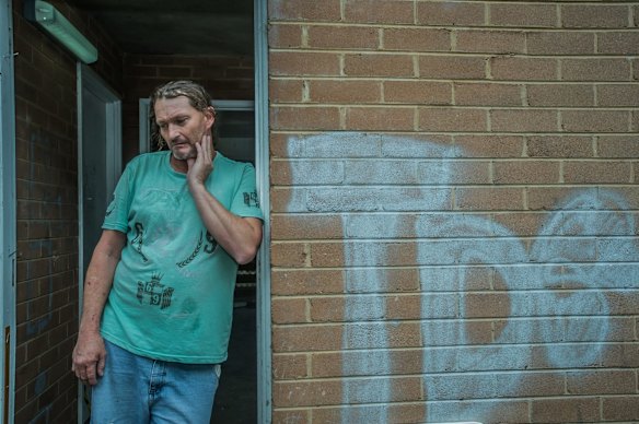 Tenders for the demolition of the Red Hill flats have been called for. Current resident Troy Osborn. 