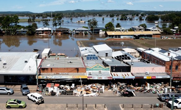 The shops along the main street of Woodburn have leave their destroyed goods on the footpath, after the entire town in the Northern Rivers region of NSW, was damaged by flood waters.