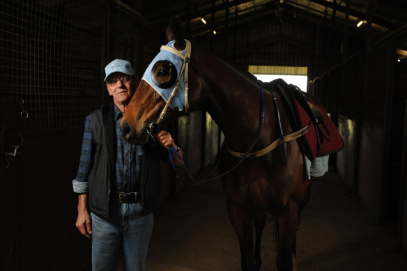 Old school: Mick Burle with The Cleaner at his stables in Longford, Tasmania.