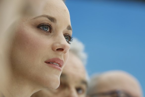 Actress Marion Cotillard watches the Chanel ready to wear Fall-Winter 2019-2020 collection, that was presented in Paris, Tuesday, March 5, 2019. (AP Photo/Thibault Camus)