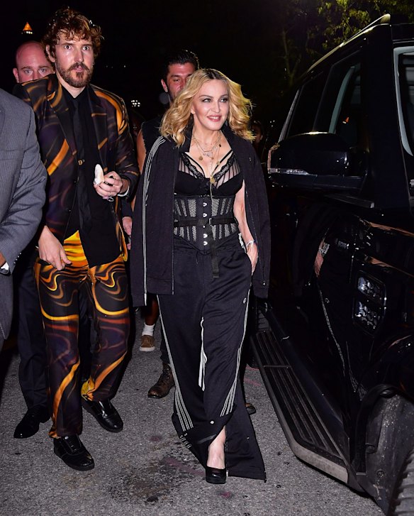 Madonna threw on some of Alexander Wang's new adidas activewear to attend his ready-to-wear show.