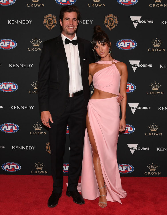 Ben Stratton of the Hawks and Laura Griffin arrive 