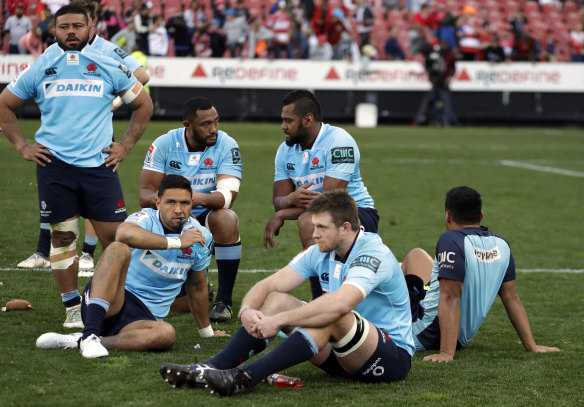 Dejected Waratahs players after losing to the Lions.