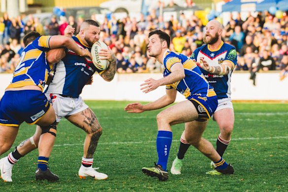 Tuggeranong Bushrangers Jamal Nchouki scores a try.

