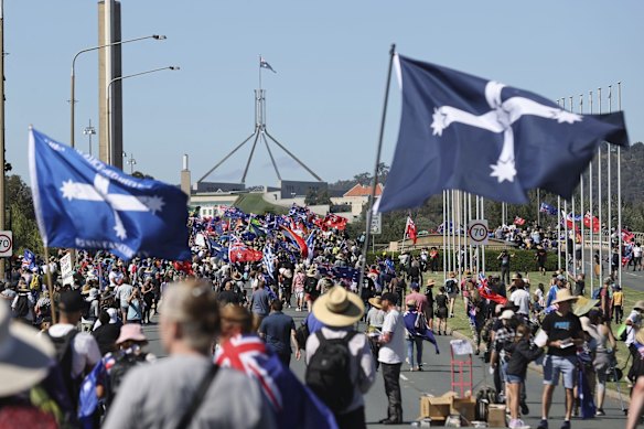 'Convoy to Canberra' protesters march towards the Parliamentary triangle, in Canberra.