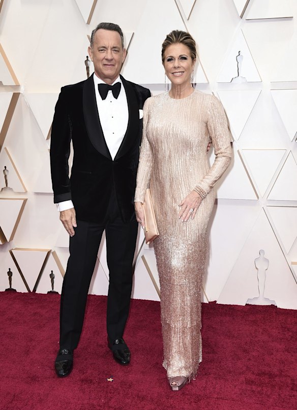 Tom Hanks, left, and Rita Wilson arrive at the Oscars.