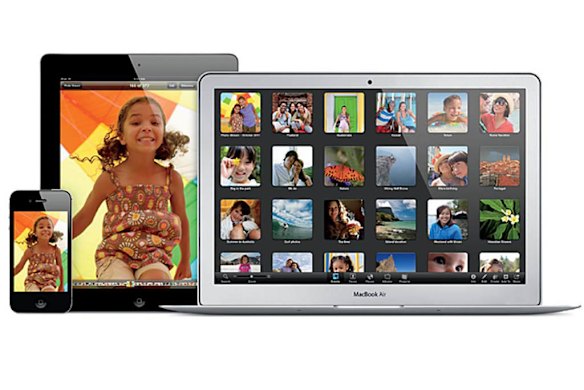 The iPhone 4S with iPad and MacBook Air.