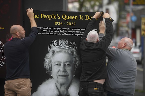 A mural is hung in Belfast following the death of Queen Elizabeth II, Friday Sept. 9, 2022.