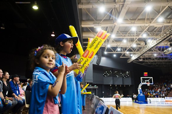 The crowd is excited to see Canberra Capitals. 