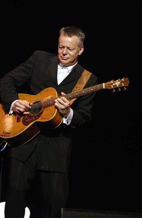 Tommy Emmanuel with his Maton guitar.