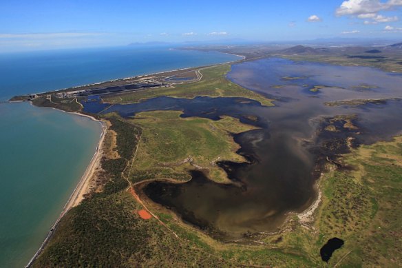 The Abbott Point coal loading facility with coal water run off moving North West into the Wetlands.