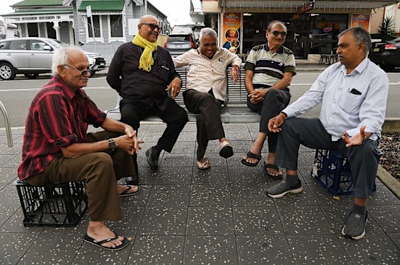 Dhanjinhs, Thakur Harshadbhai, Kanubhai Patel, Rajanikant Modi and Gondal Natubhaipatel sit on Wigram street in Harris Park.