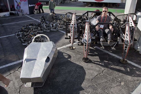 The Mondo Spider, right, a 725-kilogram mechanical spider powered with hydraulics, and the 544-kilogram Titanoboa.