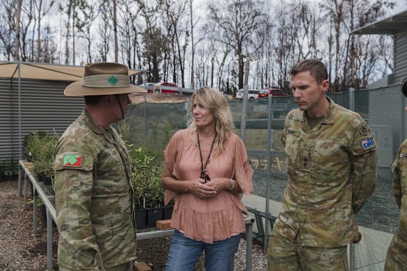 Colonel Warwick Young and Lieutenant Henry Stimpson speak with Liz Innes, Mayor of the Eurobodalla Shire Council at Eurobodalla Regional Botanic Gardens in Mogo.