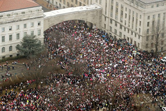 Protesters crowd Independence Avenue at 14th Street in downtown Washington, during the Women's March on Washington during the first full day of Donald Trump's presidency. 