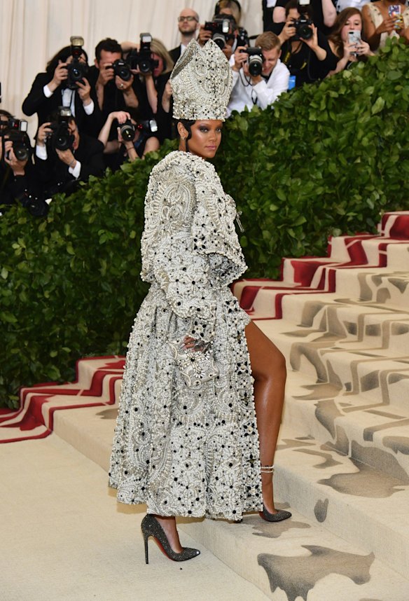 Rihanna attends The Metropolitan Museum of Art's Costume Institute benefit gala celebrating the opening of the Heavenly Bodies: Fashion and the Catholic Imagination exhibition on Monday, May 7, 2018, in New York.