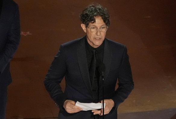 Jonathan Glazer accepts the award for The Zone of Interest for best international feature film during the 2024 Oscars.