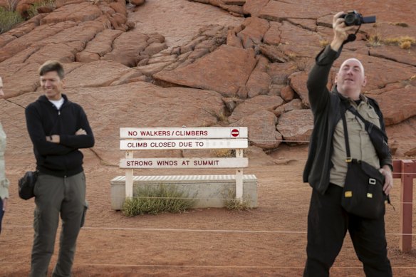 A sign at the base of the climb telling visitors the climb is on hold due to strong winds, on the final day the climb is allowed.