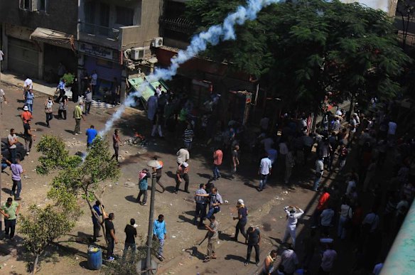 Supporters of Egypt's ousted President Mohammed Morsi clash with security forces near the largest sit-in by supporters of Morsi in the eastern Nasr City district of Cairo, Egypt.
