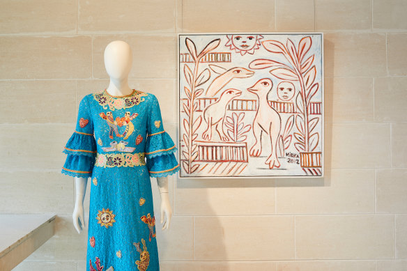 Installation view, Gorman: Ten Years of Collaborating, Heide Museum of Modern Art, Melbourne, shows Mirka Mora's Under the Sun, 2012, and the dress her work inspired.