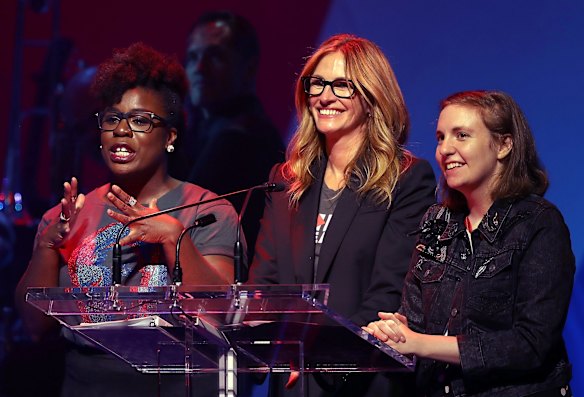 Actresses Uzo Aduba, Julia Roberts and Lena Dunham appear on stage