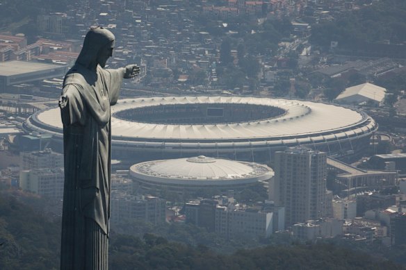 Christ the Redeemer stands above Rio's Maracana stadium where electricity has been cut in a battle over unpaid bills. 