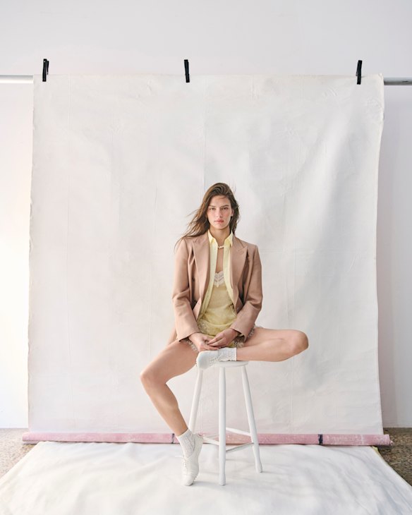 Oroton blazer, $599. LMND “Chiara” shirt, $159. Zara lace camisole, $80, and shorts, $80. 