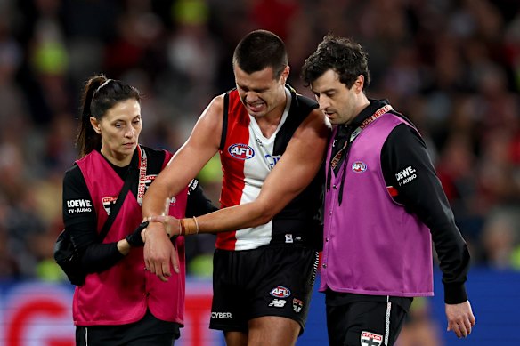 Hoping for a quick return: Jack Silvagni leaves the ground with a dislocated shoulder on Saturday.