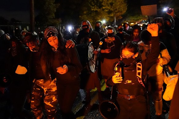 People march on the night of the election, in Portland, Oregon.