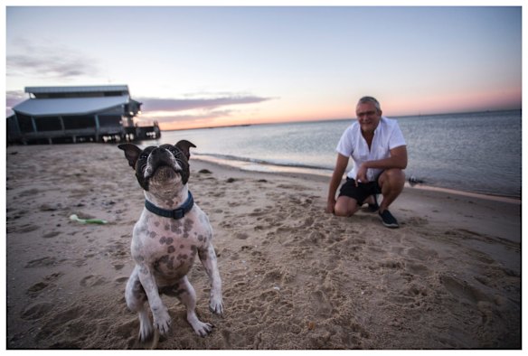 Miss Maudie having a ball at Port Melbourne Beach with Neil McMahon. 