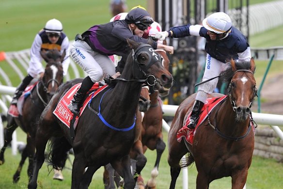 Green Moon jockey Brett Prebble, celebrates with Fiorente's rider James McDonald.