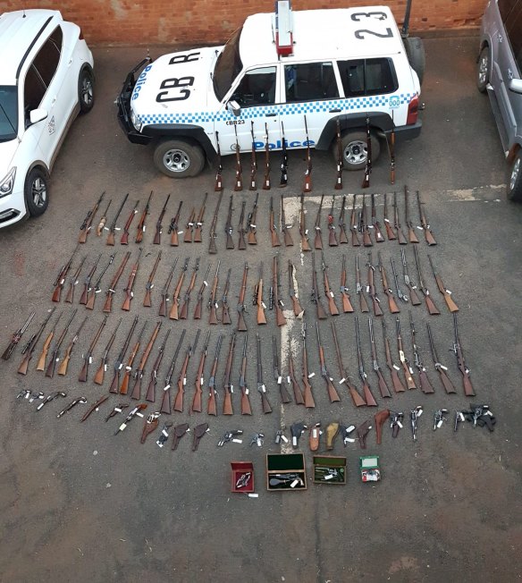 More than 100 guns seized by police from a home in Cobar.