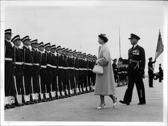 The Queen inspects the R.A.A.F. guard at Essendon before she leaves for Brisbane, March 11, 1954.