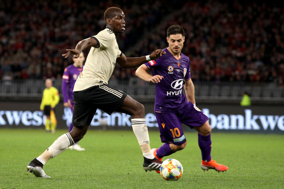 Paul Pogba of Manchester United and Bruno Fornaroli of the Glory in action.