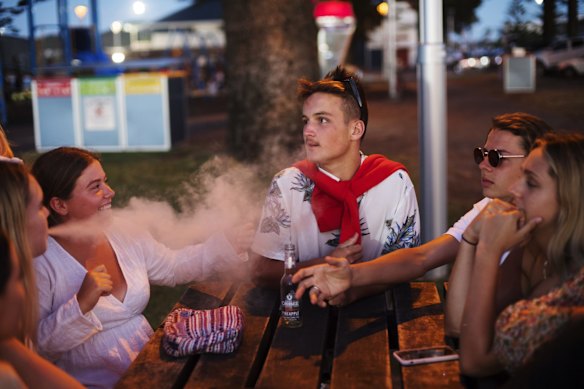 Schoolies from Kincumber High School in the park at Main Beach.